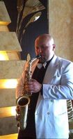 Саксофонист на свадьбе с выездной церемонией в Киеве